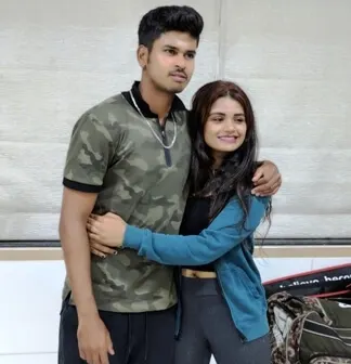 Shreyas Iyer posing with his younger sister Shreshta Iyer