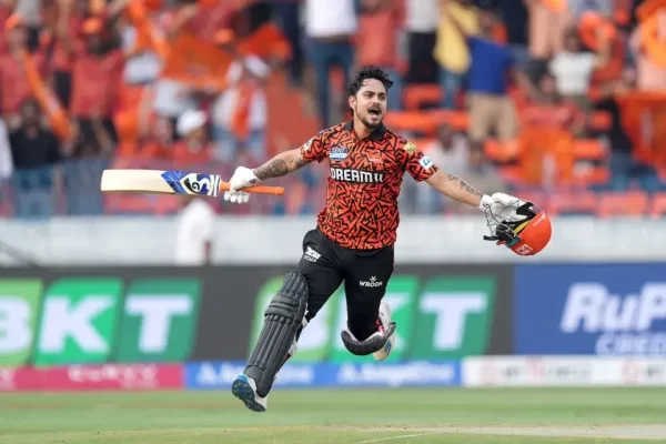 Ishan Kishan celebrating with bat and helmet in Sunrisers Hyderabad IPL jersey