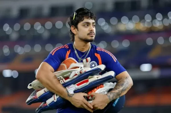 Ishan Kishan carrying batting equipment during an India cricket training session