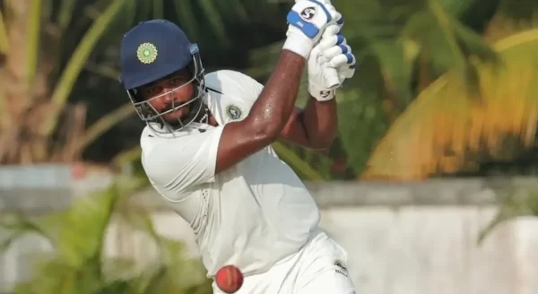 Sanju Samson playing an attacking batting shot during a domestic cricket match.