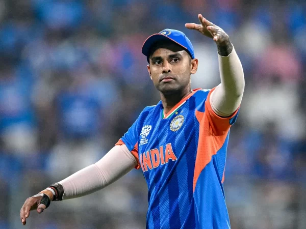 Suryakumar Yadav representing India and directing teammates during an international cricket match.