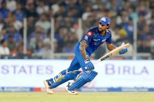 Tilak Varma batting for Mumbai Indians during an IPL match in the blue franchise kit.