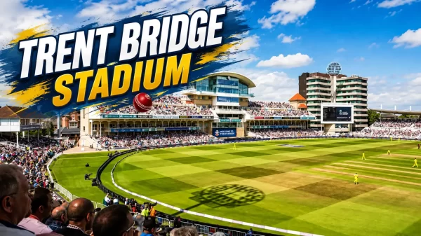 Wide view of Trent Bridge Cricket Ground in Nottingham under a bright blue sky, showing the green cricket field, central pitch, stands, spectators, and floodlights.